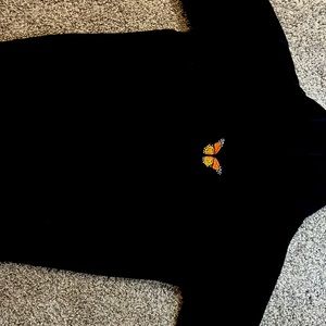 Black hoodie with butterfly patch